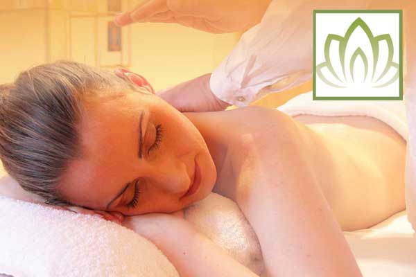 Woman face down while receiving a massage