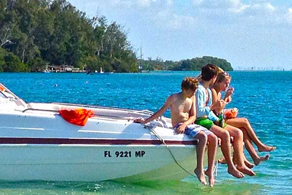 tourists on a boat at bradenton beach marina